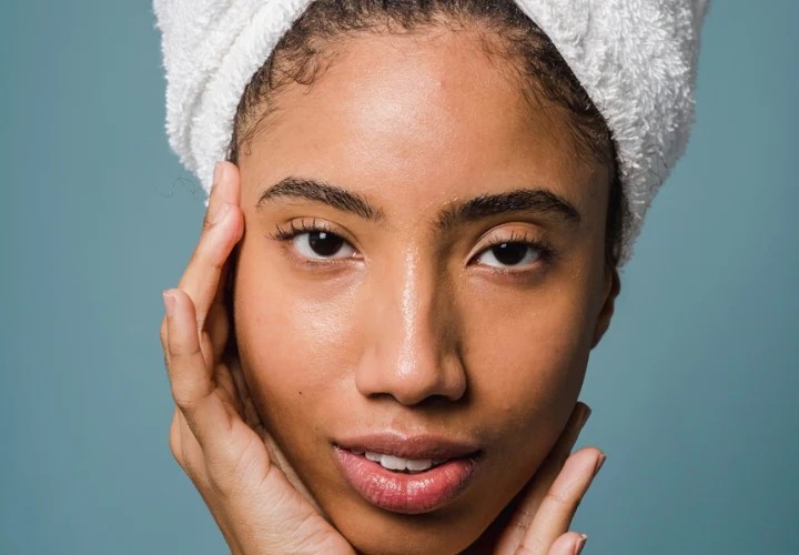 Skin care dark portrait beautiful demonstrating cosmetic african looking special woman young